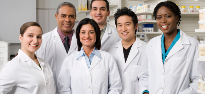 A group of pharmacy team members smiling