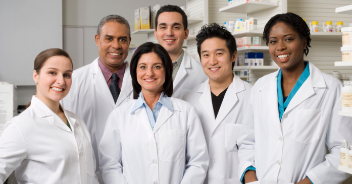 A group of pharmacy team members smiling